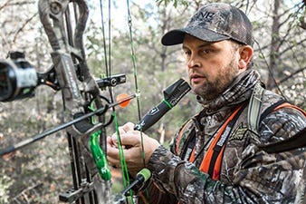 The Outlaw Deer Call Being Used by a Bowhunter