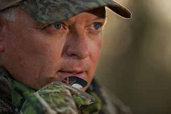 Hunter Using Mouth Call