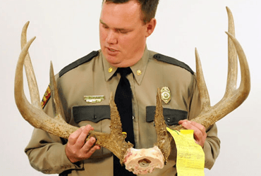 Sheriff Holding World Record 8-Point 