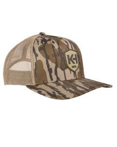 Angled view of the Knight & Hale Adjustable Snapback Trucker Cap in Mossy Oak Original Bottomland camo